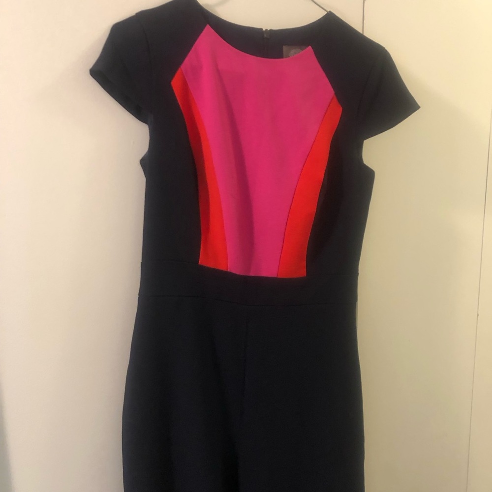 Block colored jumpsuit! Looks black but is actually navy blue